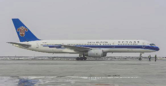 A jet plane is seen ready to take off, heading to Kaohsiung,Taiwan, from Urumqi, capital of Northwest China's Xinjiang Uygur Autonomous region, March 12, 2013.