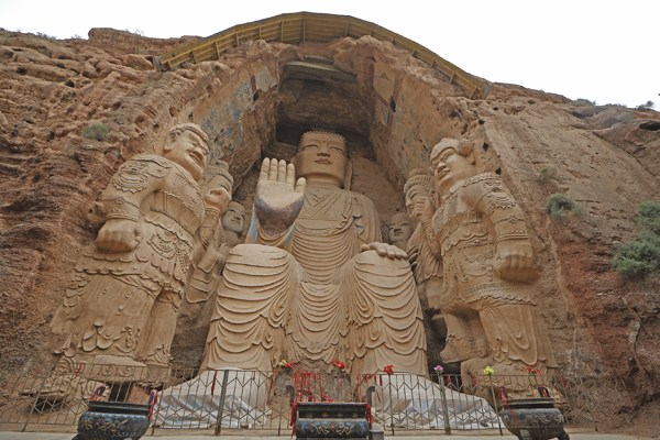 The Tiantishan Grottoes in central Gansu province's Wuwei county were dug about 1,600 years ago. Tianti means ladder to the sky and shan means mountain. [Photo by Chen Xi/For China Daily]